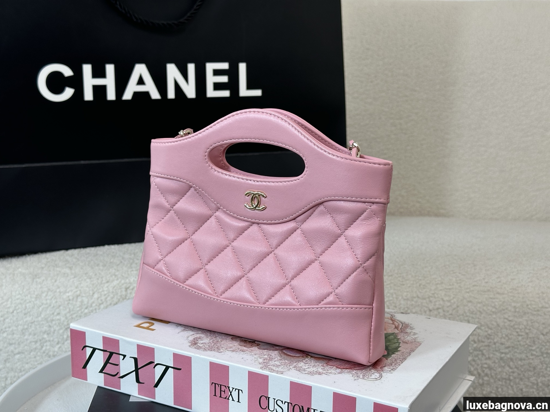 Chanel Pink quilted leather mini tote bag with chain shoulder strap