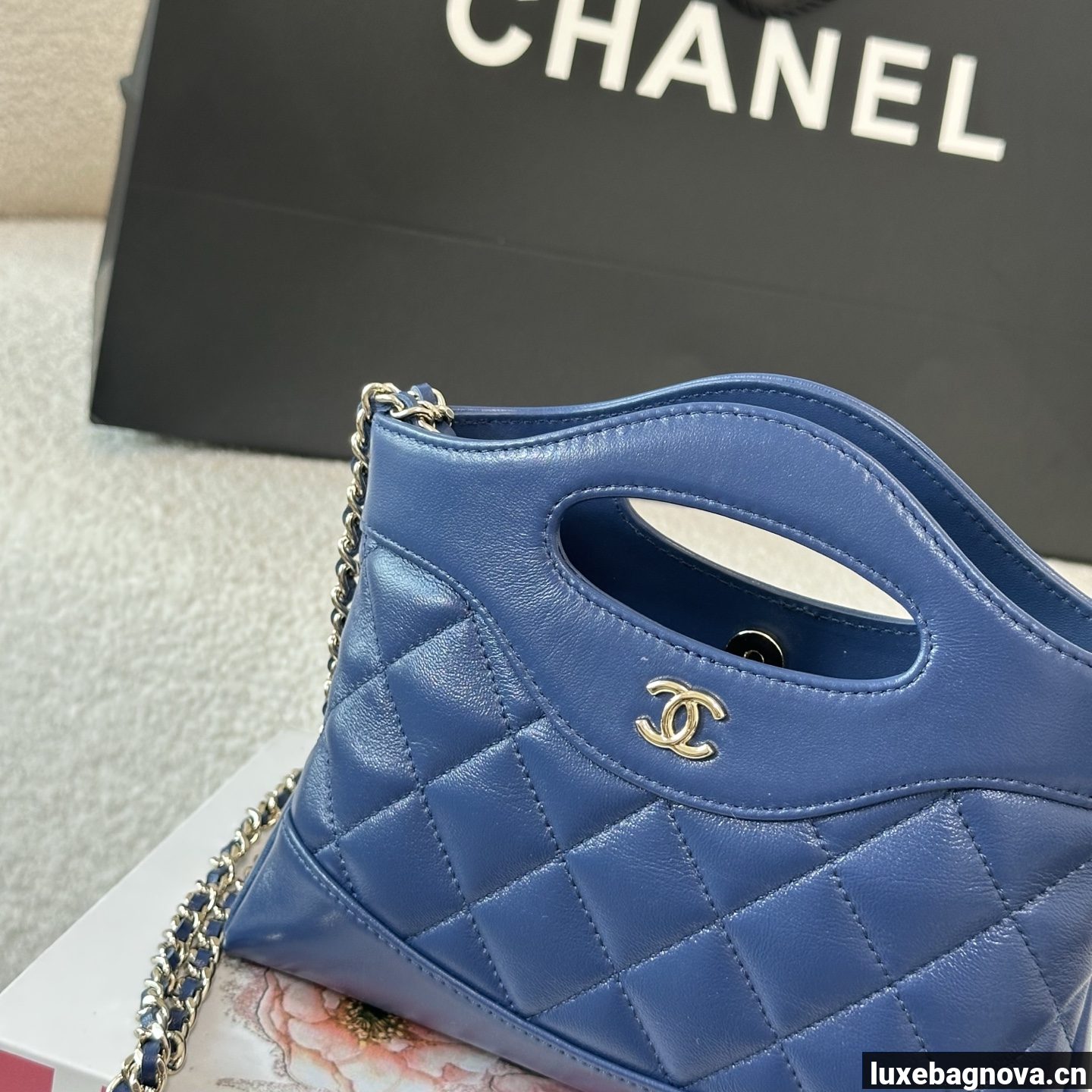 Chanel Blue quilted leather mini tote bag with chain shoulder strap