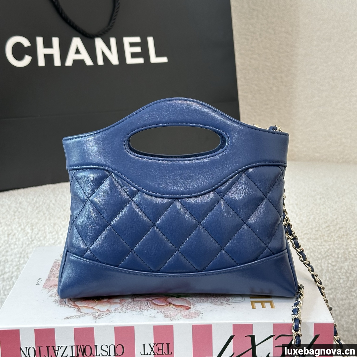 Chanel Blue quilted leather mini tote bag with chain shoulder strap