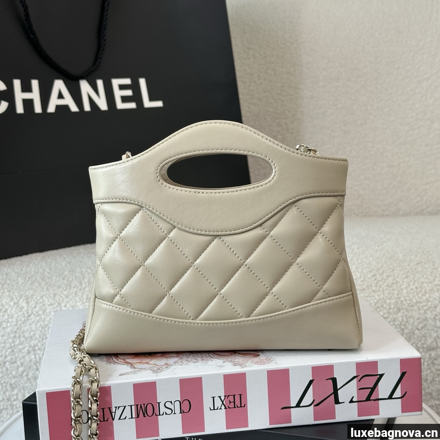 Chanel Beige quilted leather mini tote bag with chain shoulder strap