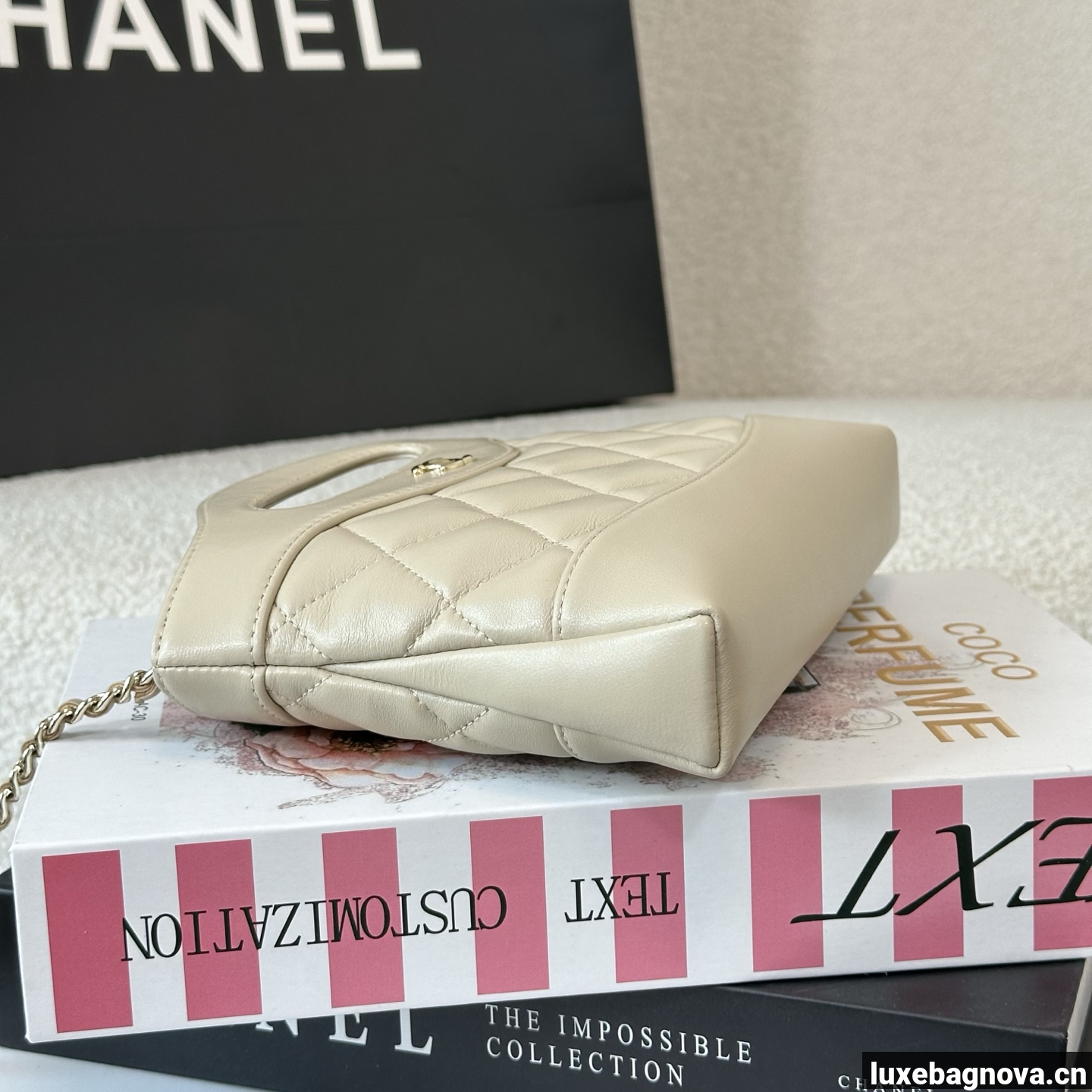 Chanel Beige quilted leather mini tote bag with chain shoulder strap