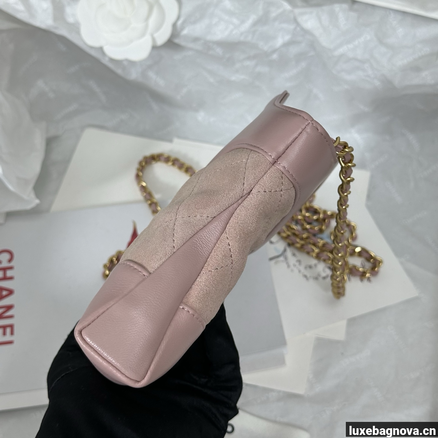 Chanel Light Pink quilted leather mini tote bag with chain shoulder strap