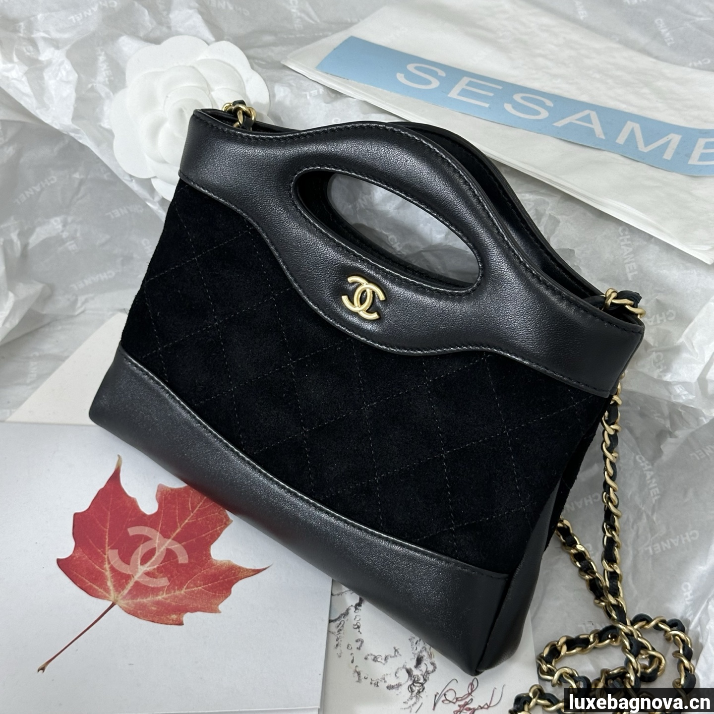 Chanel Black quilted leather mini tote bag with chain shoulder strap