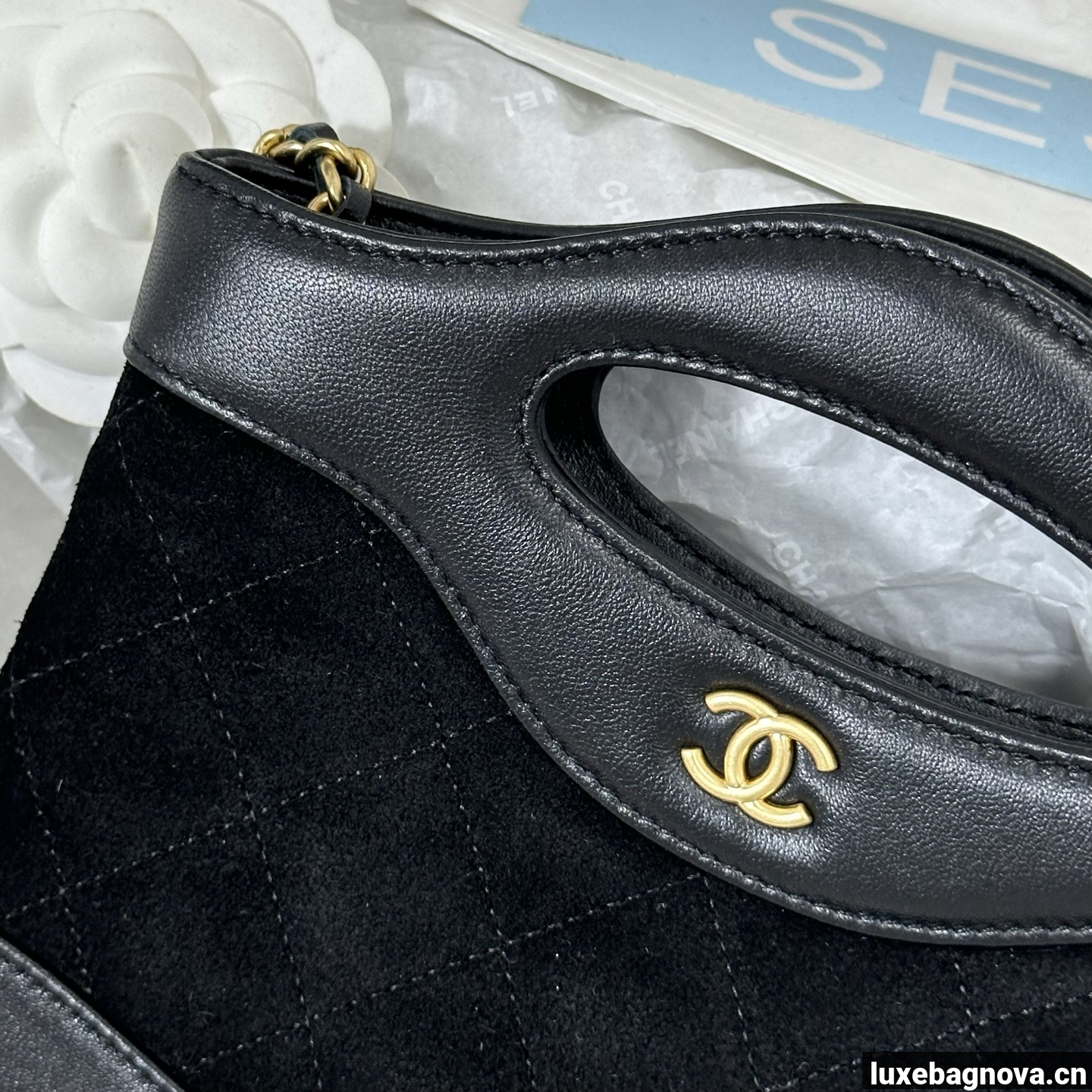 Chanel Black quilted leather mini tote bag with chain shoulder strap