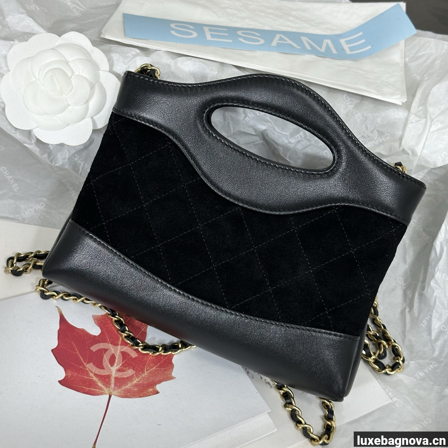 Chanel Black quilted leather mini tote bag with chain shoulder strap
